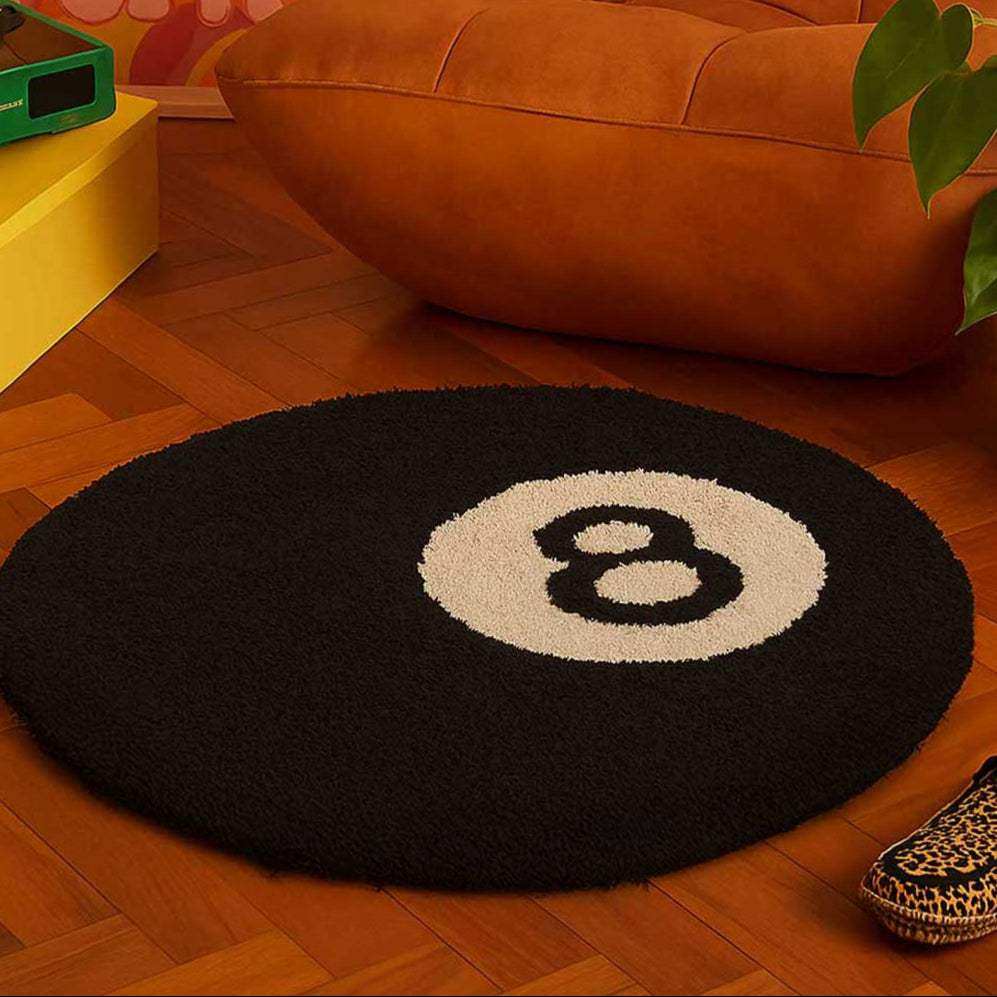 Black circular ball rug with white and black number eight design perfect for game room decor