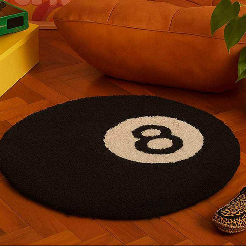 Black circular ball rug with white and black number eight design perfect for game room decor