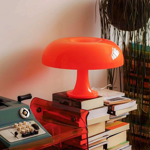 Vibrant orange ambient mushroom desk lamp with glossy translucent plastic body perfect as a desk lamp