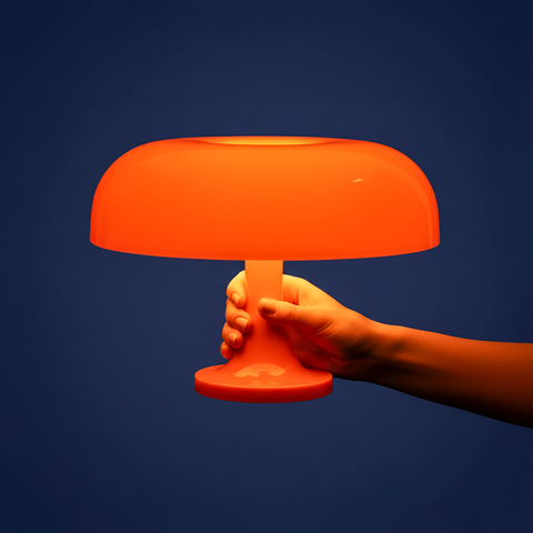 Vibrant orange ambient mushroom desk lamp with smooth translucent plastic body for stylish lighting on your desk