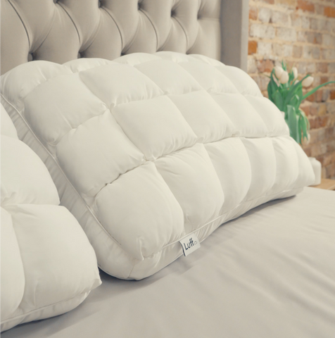 The bamboo paradise pillow is a white quilted pillow with soft plush texture and subtle stitching details