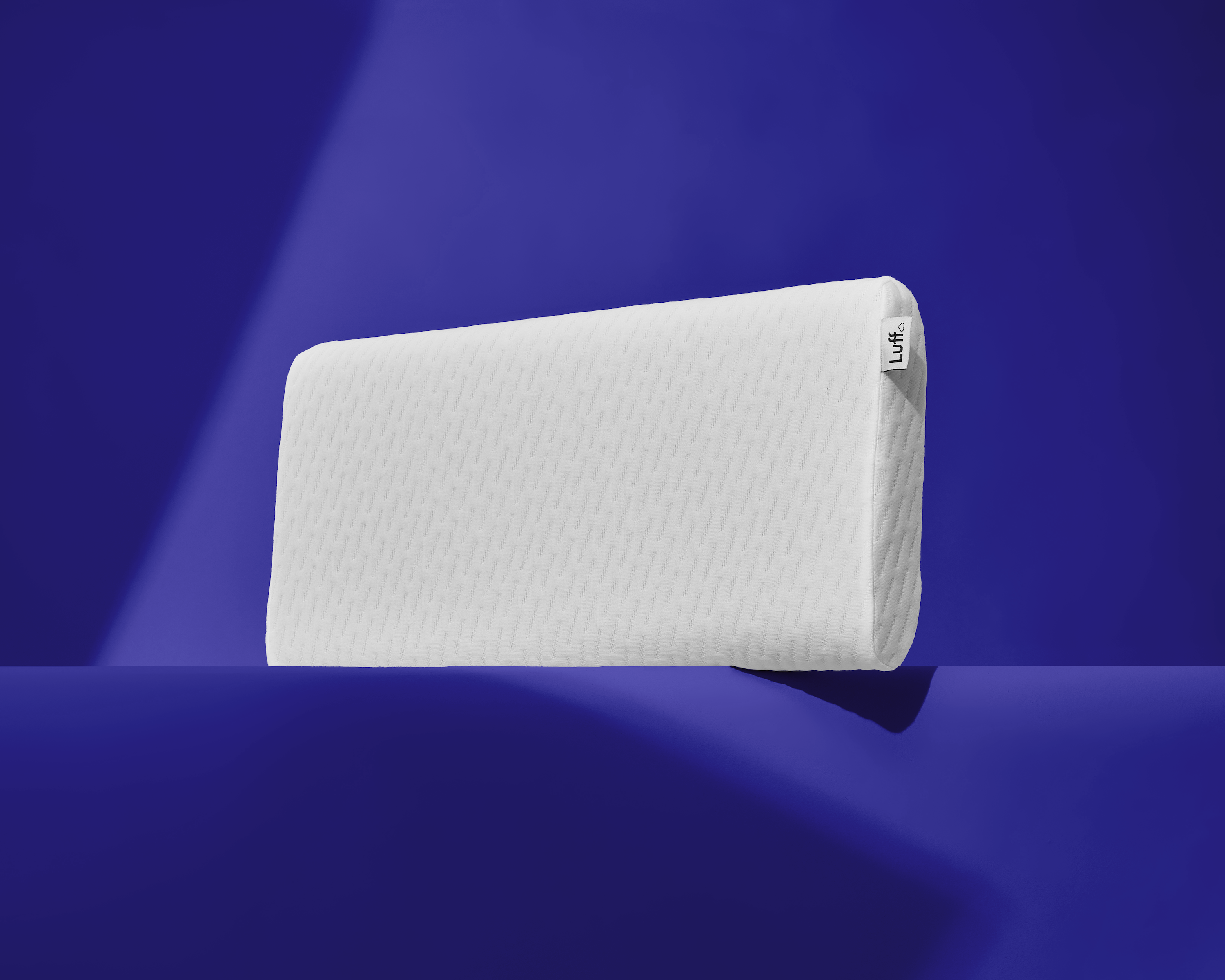 The bamboo skinny pillow white loft memory foam with textured surface and subtle edge stitching