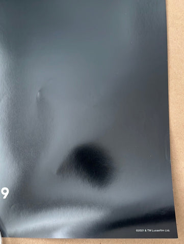 A blurry black and white face image on the original us one sheet tv poster for star wars the book of boba fest 2021