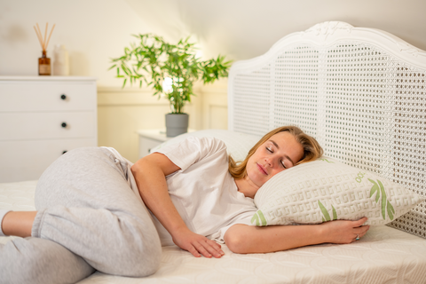 White bamboo pillow from the cambridge firm with green leaf pattern and textured surface for better sleep