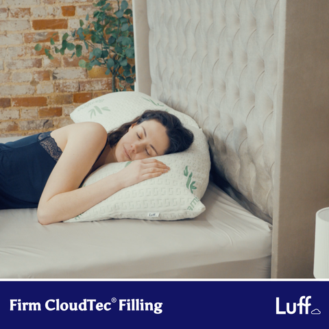 White pillow with green leaf embroidery and luff branding featuring firm cloudtec filling called the cambridge firm bamboo pillow