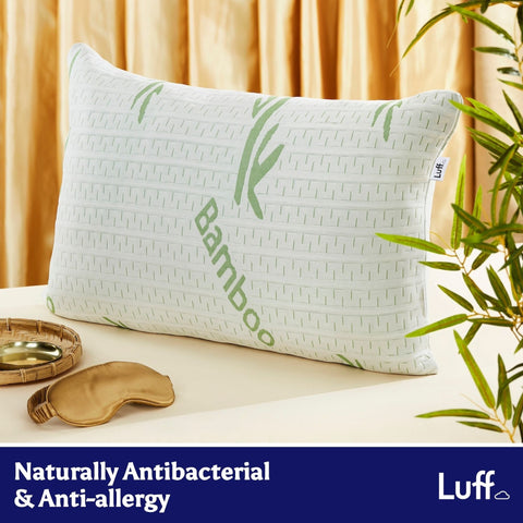 White bamboo-patterned pillow with green luff branding and subtle woven texture from the cambridge firm bamboo pillow
