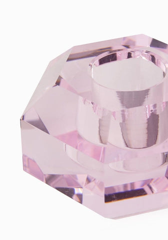 A pair of faceted pink crystal candle holders with clear central wells called the cushion and asscher