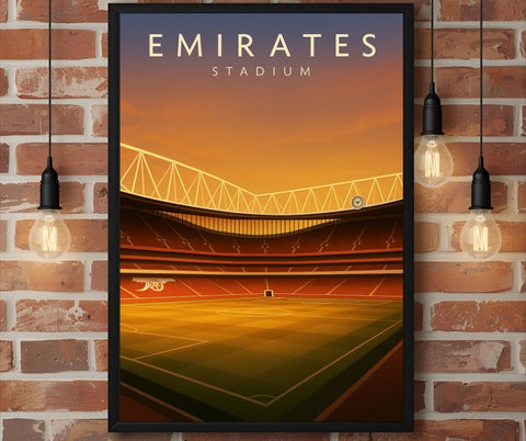 A framed wall art poster of emirates stadium with a warm orange sunset and arsenal club crest on the field stadium wall