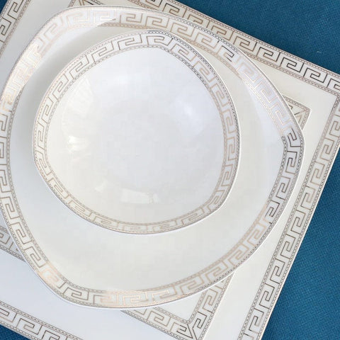 White ceramic bone china dinner set with elegant silver greek key pattern trim perfect for stylish dining