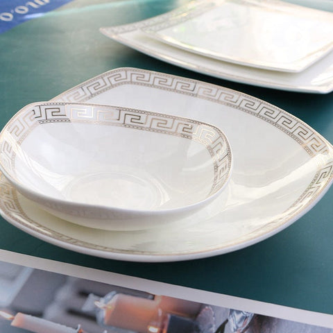 White ceramic bone china dinner bowl with gold greek key rim on matching plate from glamour china dinner set