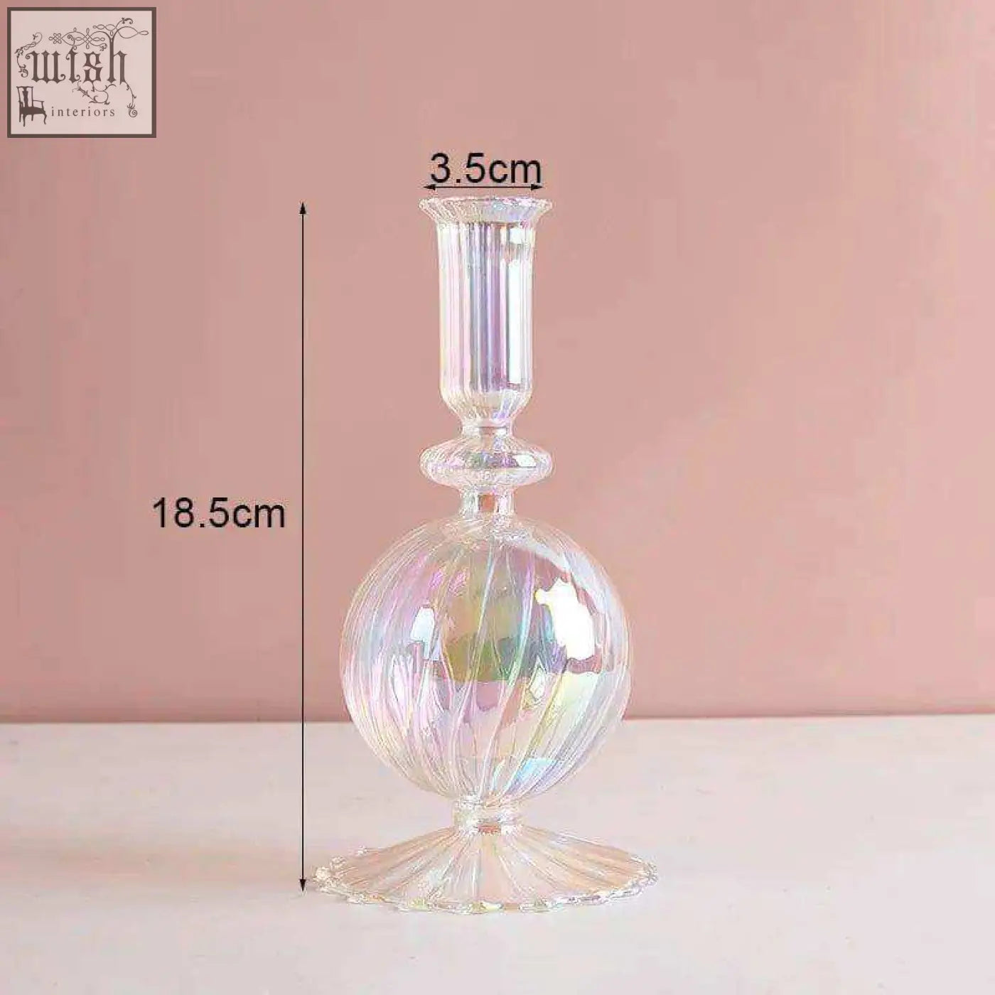 The glass candle holder features an iridescent fluted spherical body with a slender stem for elegant decor