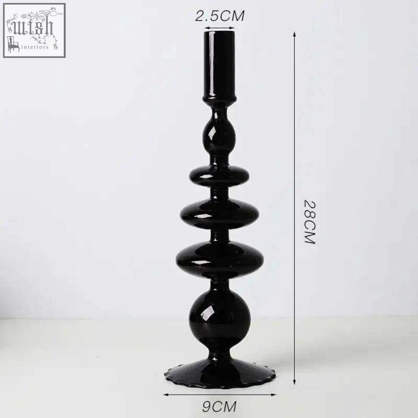 Black glossy glass candle holder with stacked rounded segments and flared base for stylish glass candle display