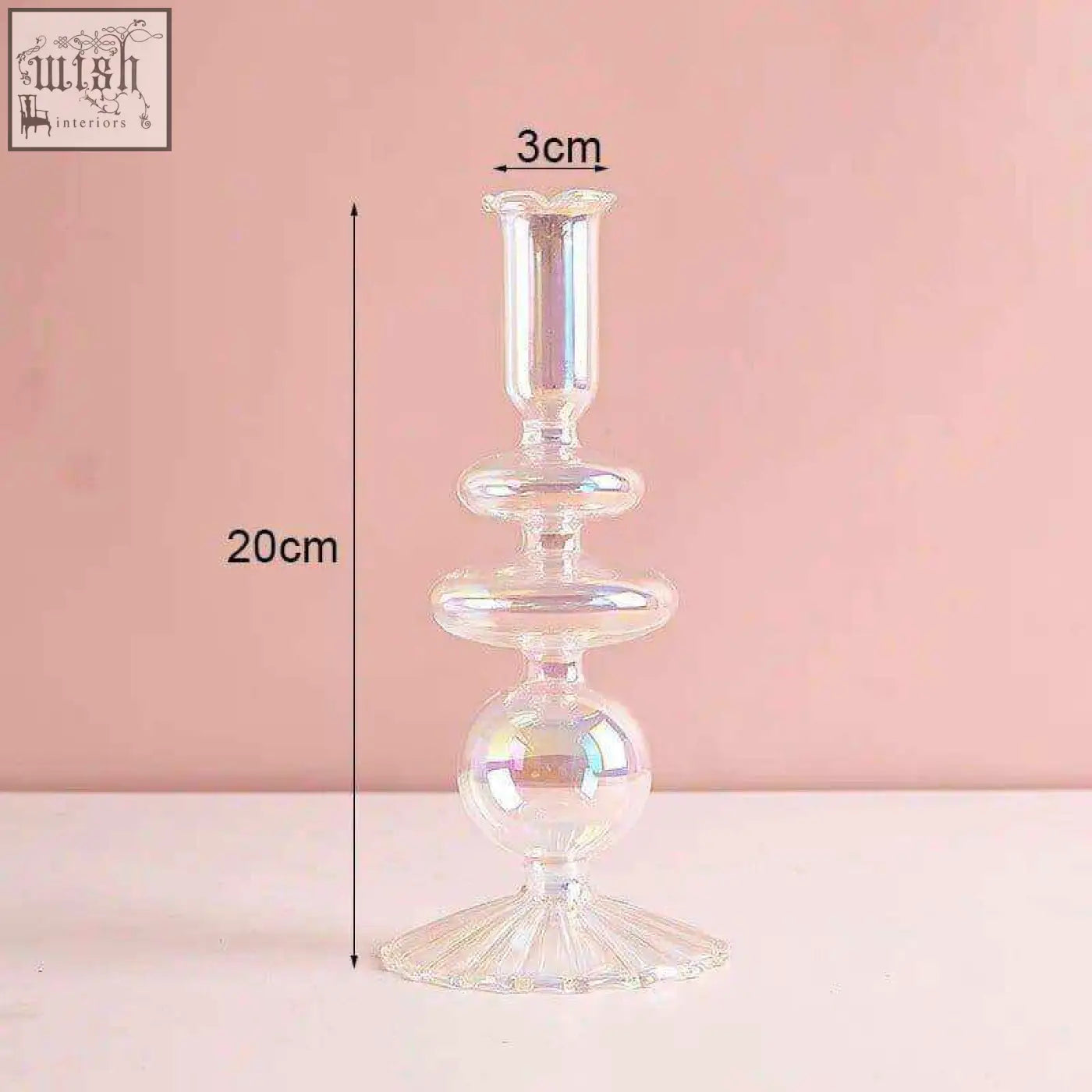 A 20cm tall clear glass candle holder with iridescent finish and tiered fluted base perfect for glass candles