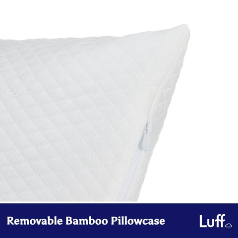 The luxury bamboo pillow features a white quilted bamboo pillowcase with a subtle diamond pattern and zipper closure