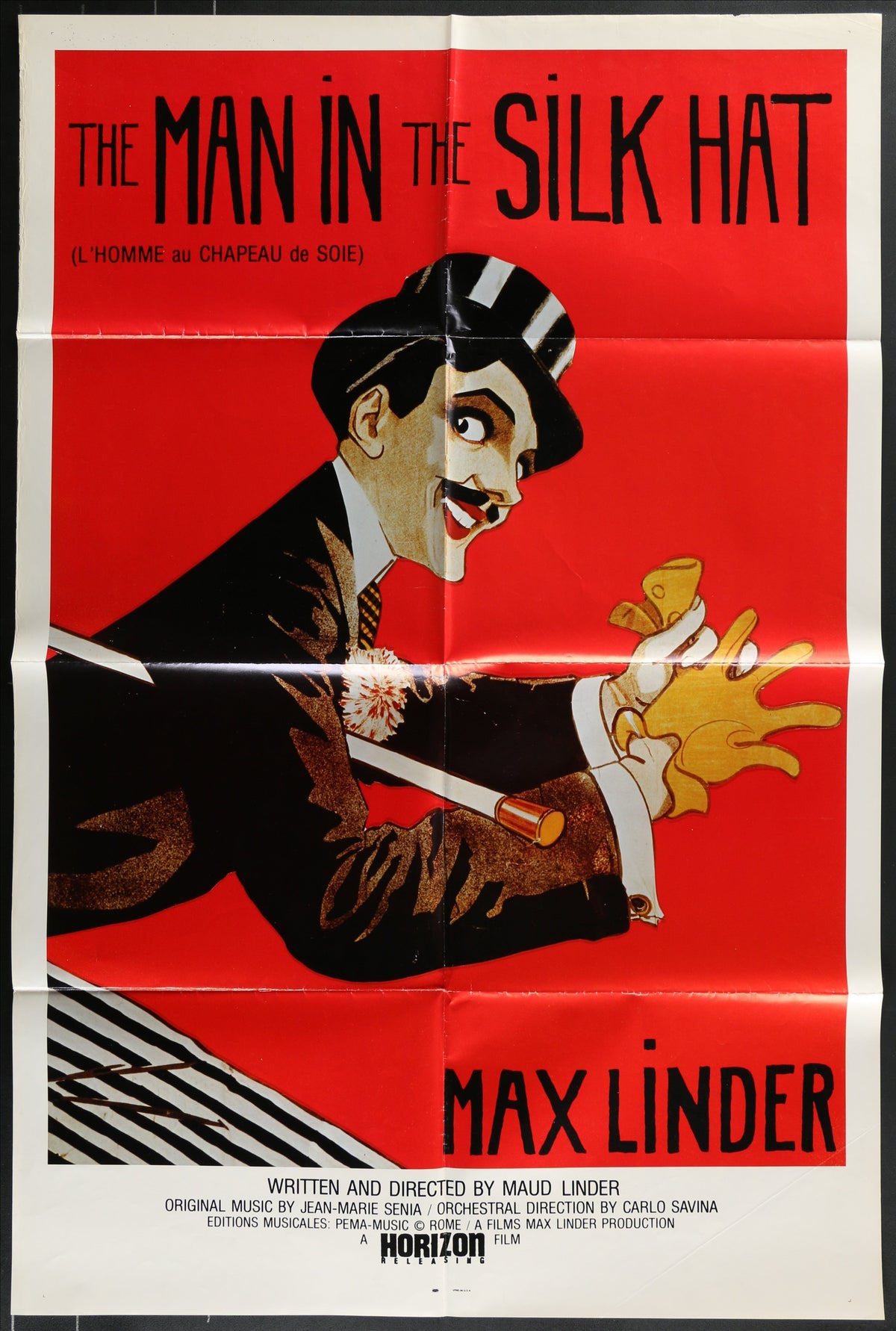 Vibrant red vintage movie poster featuring max linder wearing a silk hat for the man in the silk hat 1983