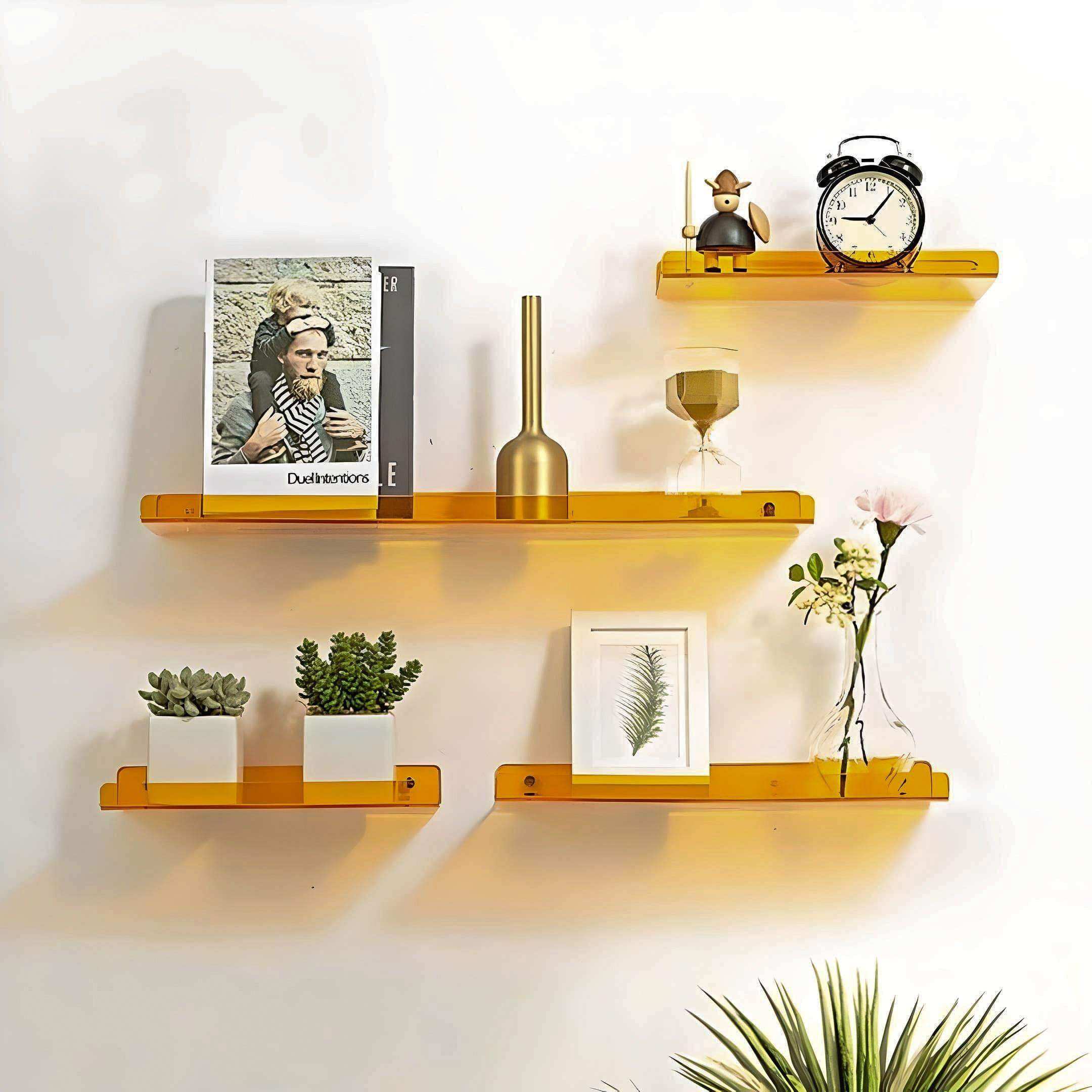 Golden minimal acrylic shelf with floating wall design perfect for sleek and modern home decor