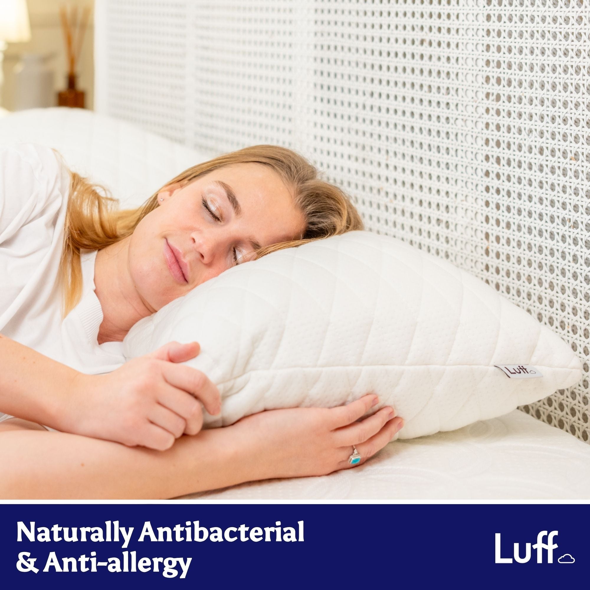 White quilted adjustable bamboo pillow with subtle brand tag for comfortable and customizable sleep