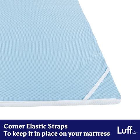 Light blue textured prestige bamboo mattress topper with white elastic corner straps for secure fit
