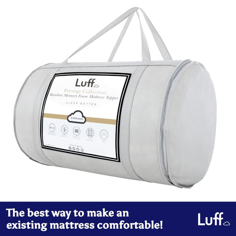 White cylindrical luff prestige bamboo memory foam mattress topper in soft textured fabric bag with reinforced handles
