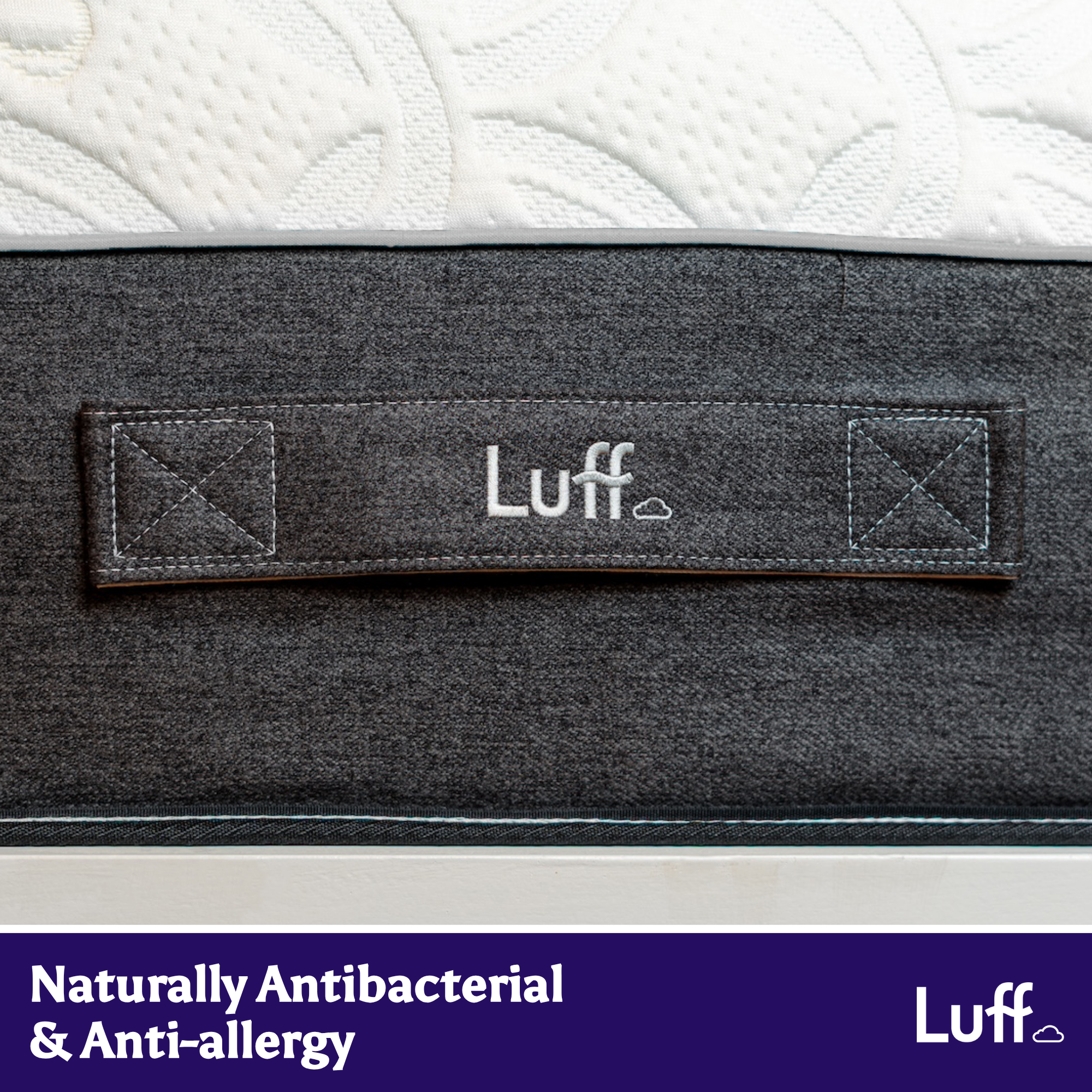 Dark gray fabric label with luff and a cloud icon on the prestige hybrid bamboo mattress cover