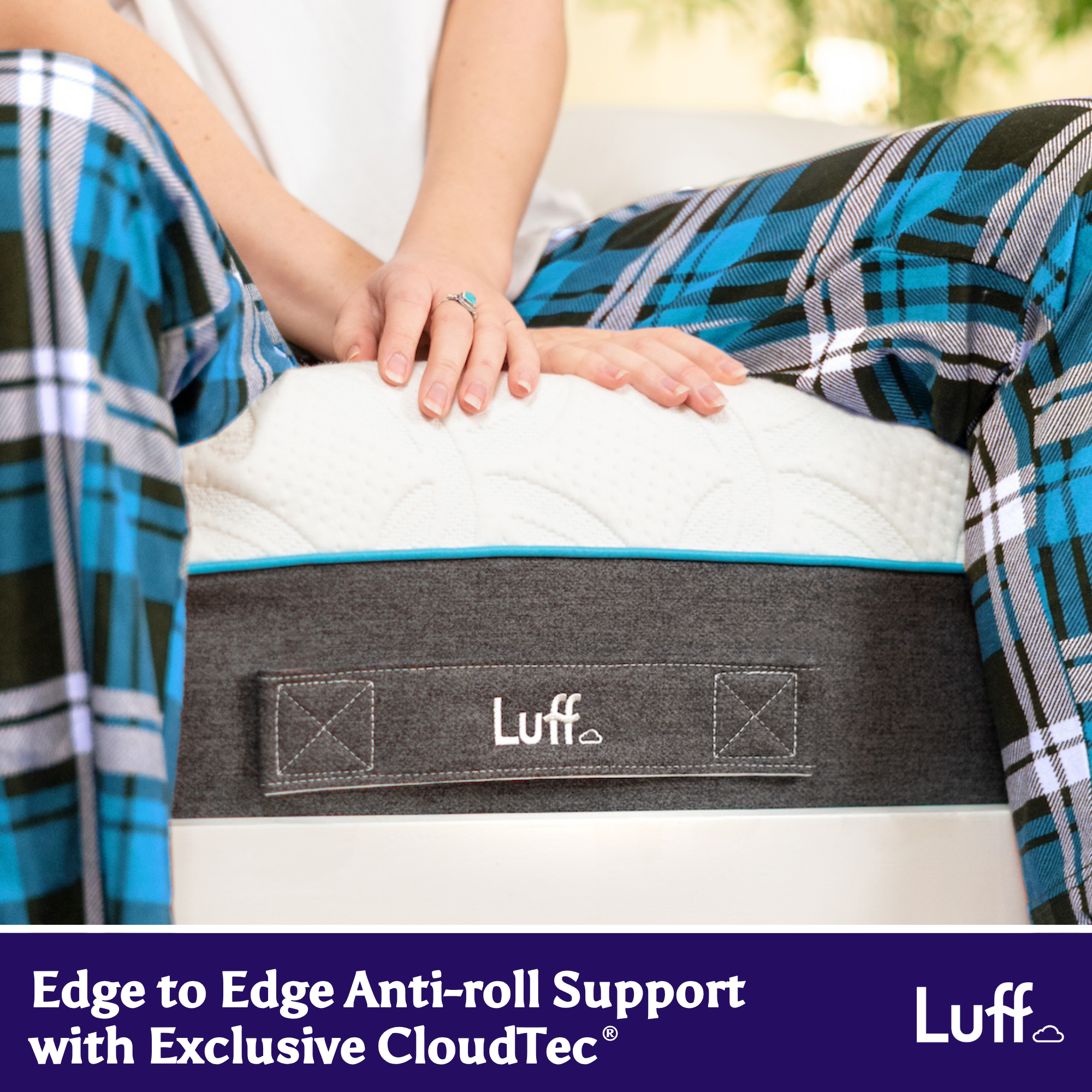 White prestige hybrid bamboo mattress with gray anti-roll band featuring luff logo and blue trim
