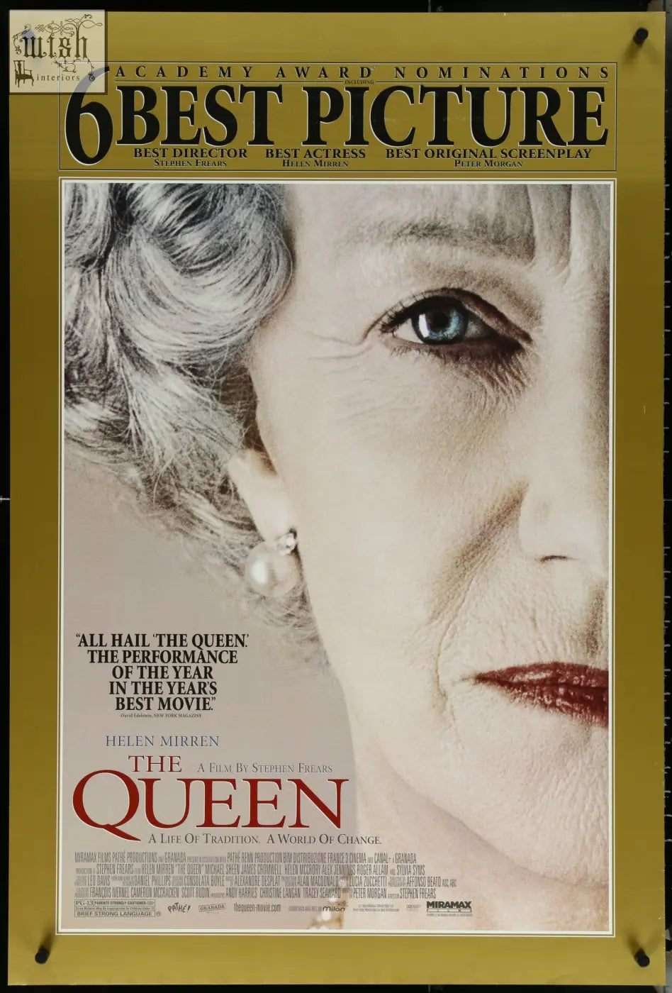 A framed one sheet movie poster for the queen 2006 featuring helen mirren with silver hair and red lipstick