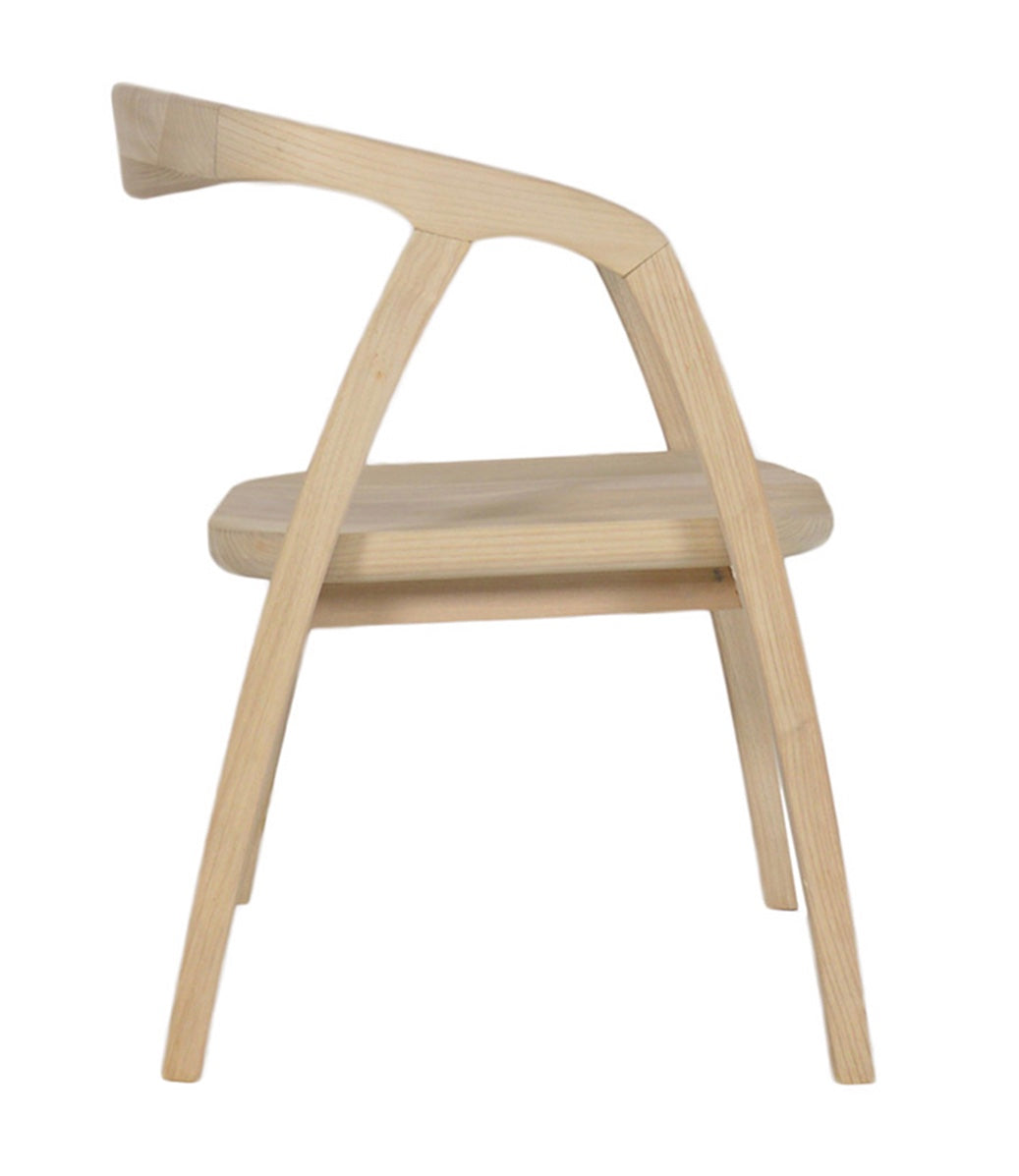 The scandi arm chair is a minimalist wooden chair with a smooth light finish and sleek curved design
