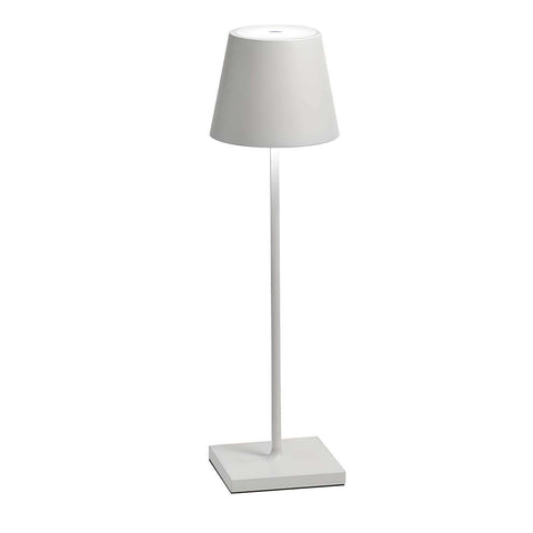 White minimalist floor lamp with sleek cylindrical stem and square base for simplistic wireless led lighting