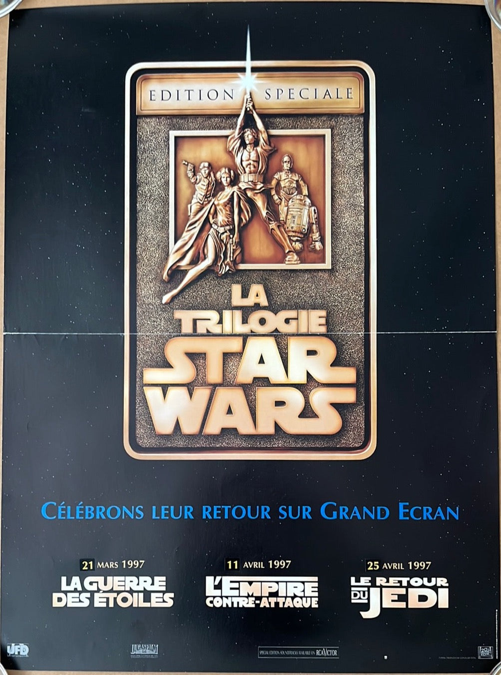 Black star wars trilogy french petite cinema poster with gold embossed title and bronze character illustration
