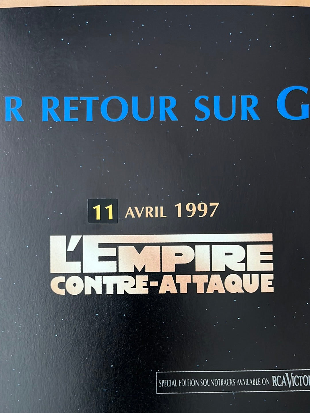 Black star wars episode i the phantom menace poster with blue and white text from the french petite star wars trilogy