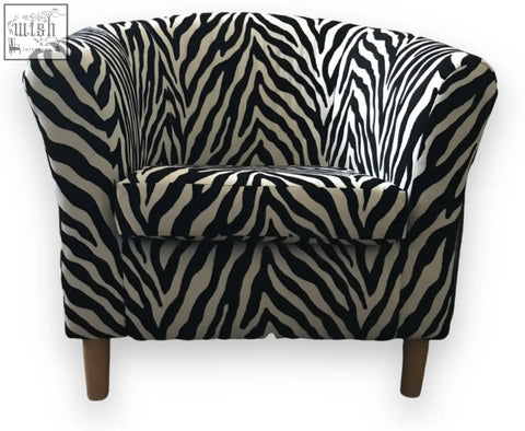 Zebra-print vibe tub chair with wooden legs featuring a stylish tub chair design for cozy seating