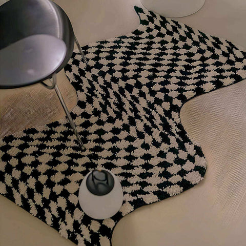 A black and white houndstooth plush wavy checkerboard rug with a soft textured surface perfect for cozy spaces