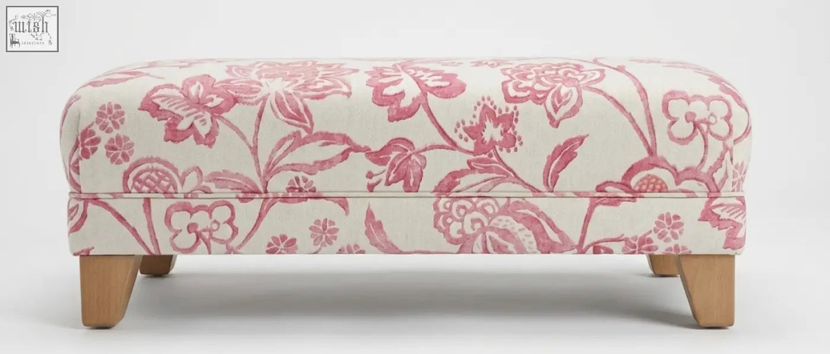 The york foot stool features a cream and pink floral upholstered top with high density foam on a solid wood frame with leg options