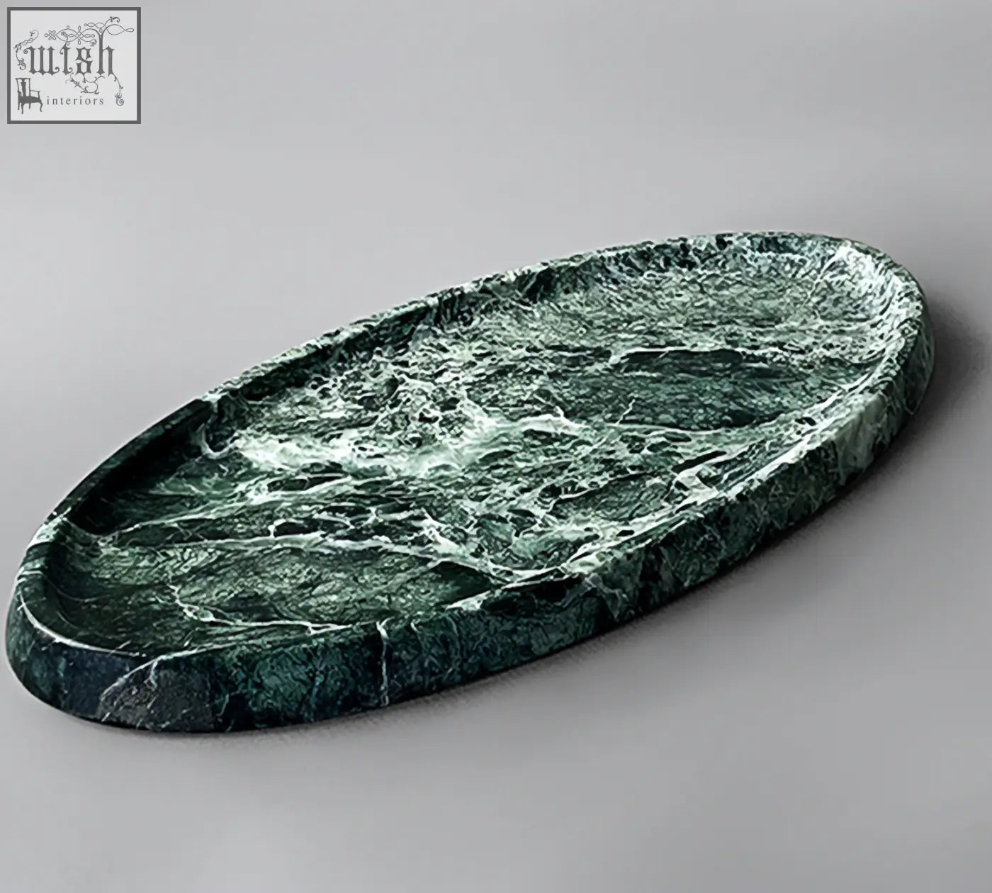 Thelonious plate tray is a dark green marble bathroom tray with swirling white veining, perfect as a stylish bathroom tray