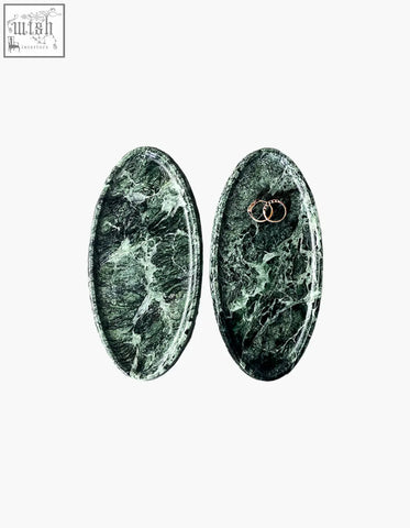Elegant oval-shaped green marble thelonious plate tray with white veining perfect as a stylish bathroom tray