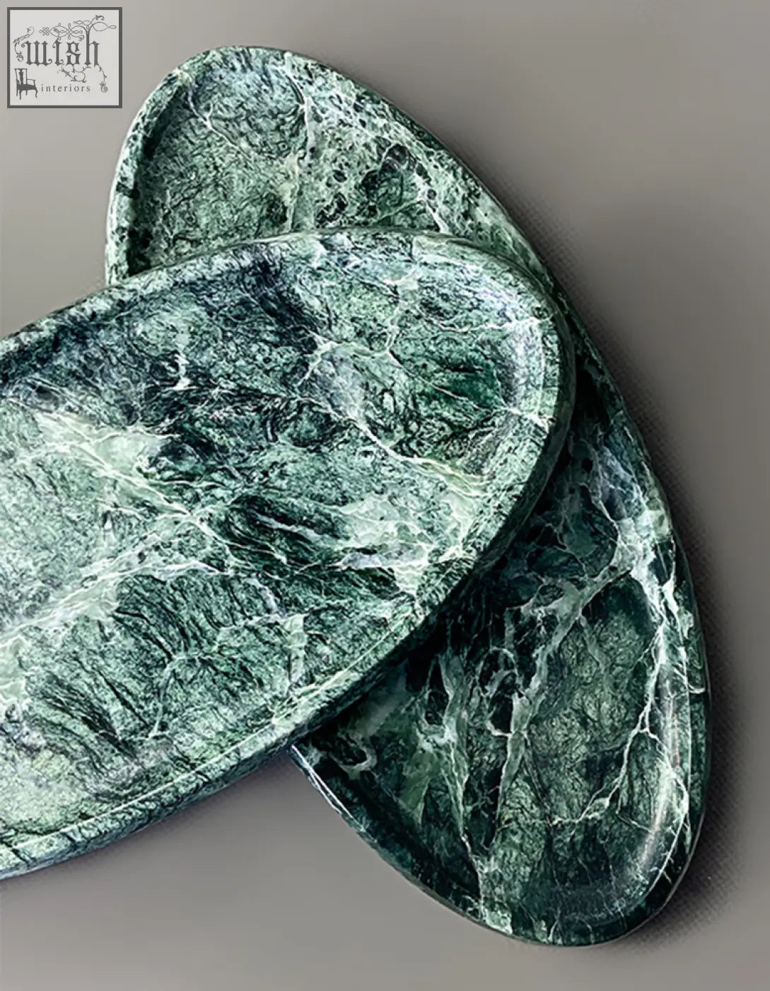 Two overlapping oval green marble thelonious trays with white veining perfect as a stylish bathroom tray