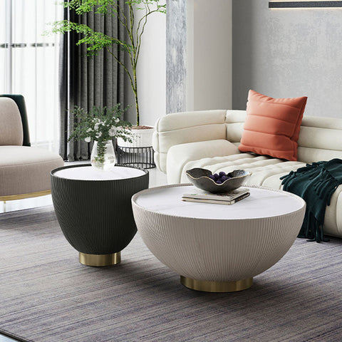 Modern oval theo coffee table set with ribbed matte black and off-white tops on polished brass bases