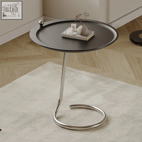 Theo side table black with sleek curved chrome base featuring durable piano baking varnish finish