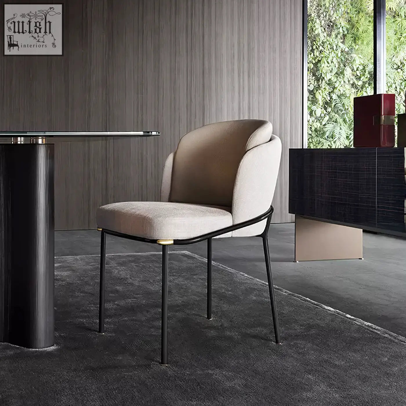 Beige upholstered theobald dining chair with sleek black metal frame and gold tone accents for stylish dining room seating