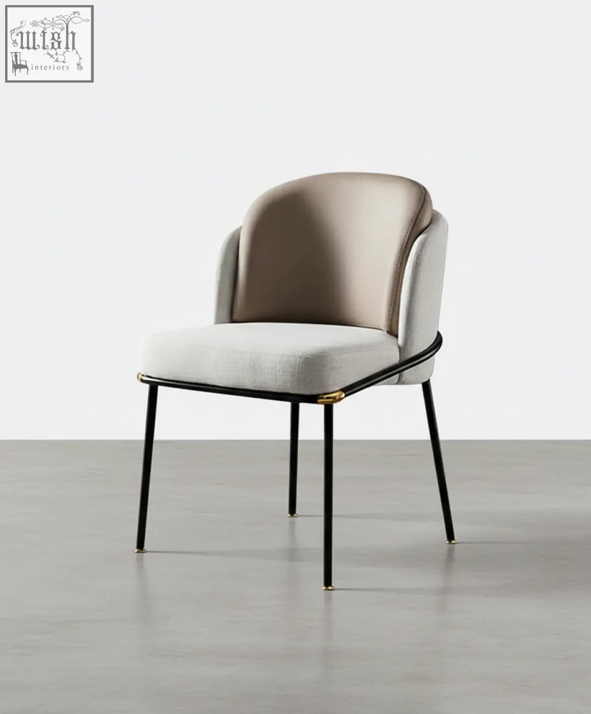 Theobald dining chair with sleek black metal frame beige gray fabric and gold-tone joint accents in modern style