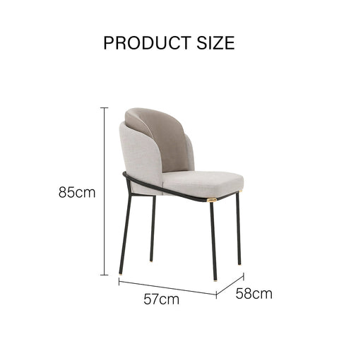 Theobald dining chair with sleek black metal frame and beige fabric seat featuring a textured gray panel