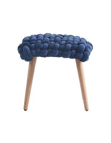 Navy blue knitted velvet knot dressing table stool with thick knot cushion and light wood legs for dressing table use