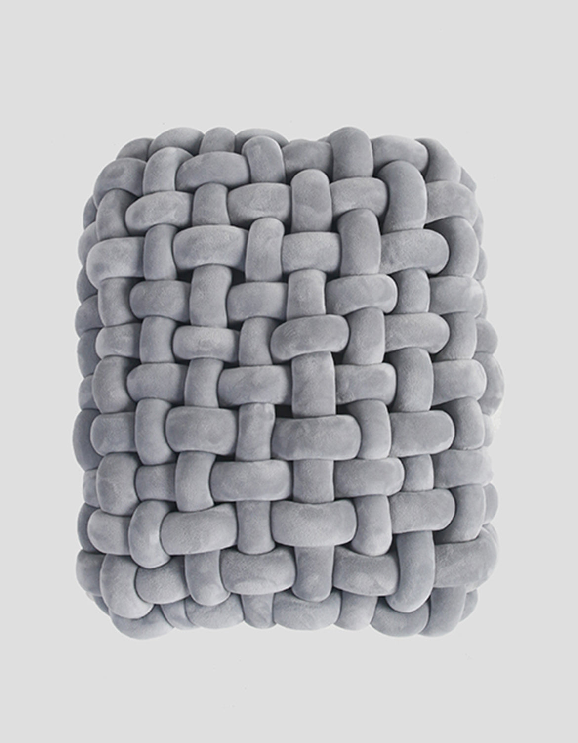 Gray plush woven dressing table stool with thick knot texture and soft interlocking looped strands for knot dressing