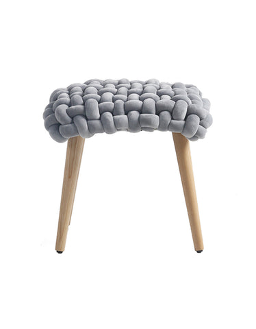 Gray knitted fabric knot dressing table stool with thick knot design and light wood legs for dressing table use