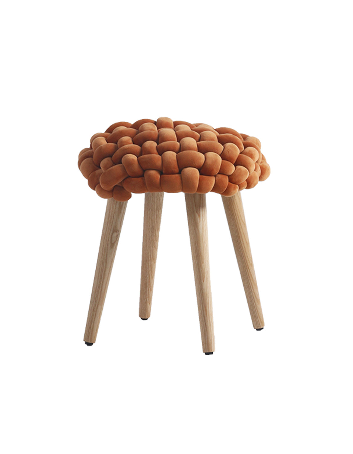 A cozy rust-colored thick knot dressing table stool with a knitted seat and slim wooden legs