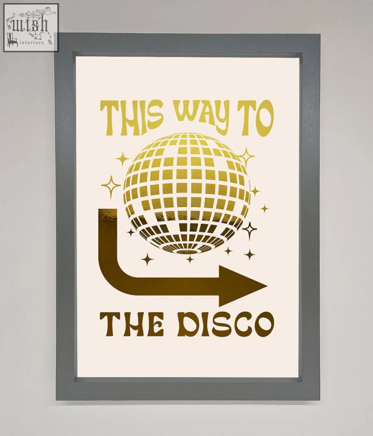 A framed poster disco foil print featuring a gold disco ball and this way to the disco text in matching gold foil