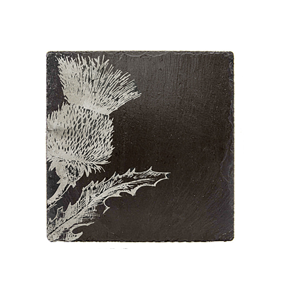 Dark gray single slate coaster with detailed white etched thistle design perfect as a slate coaster gift