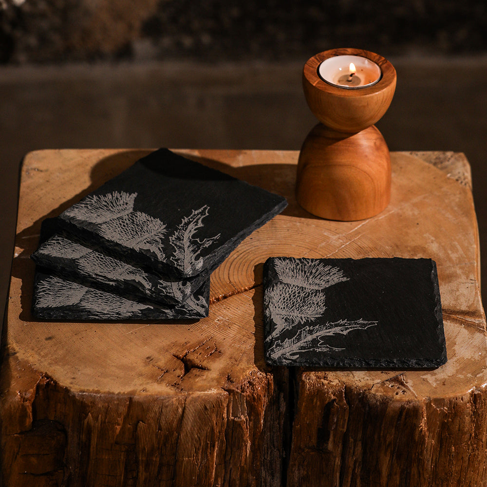 Black slate coasters set of 4 featuring engraved white thistle designs perfect for drink protection