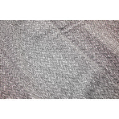 Gray herringbone-patterned wool scarf shown with thread and loom black hammam towel product focus