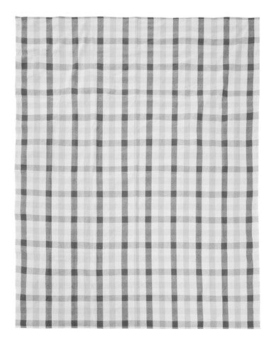 A white and gray checkered fabric napkin with a subtle grid pattern from thread and loom black check tablecloth set